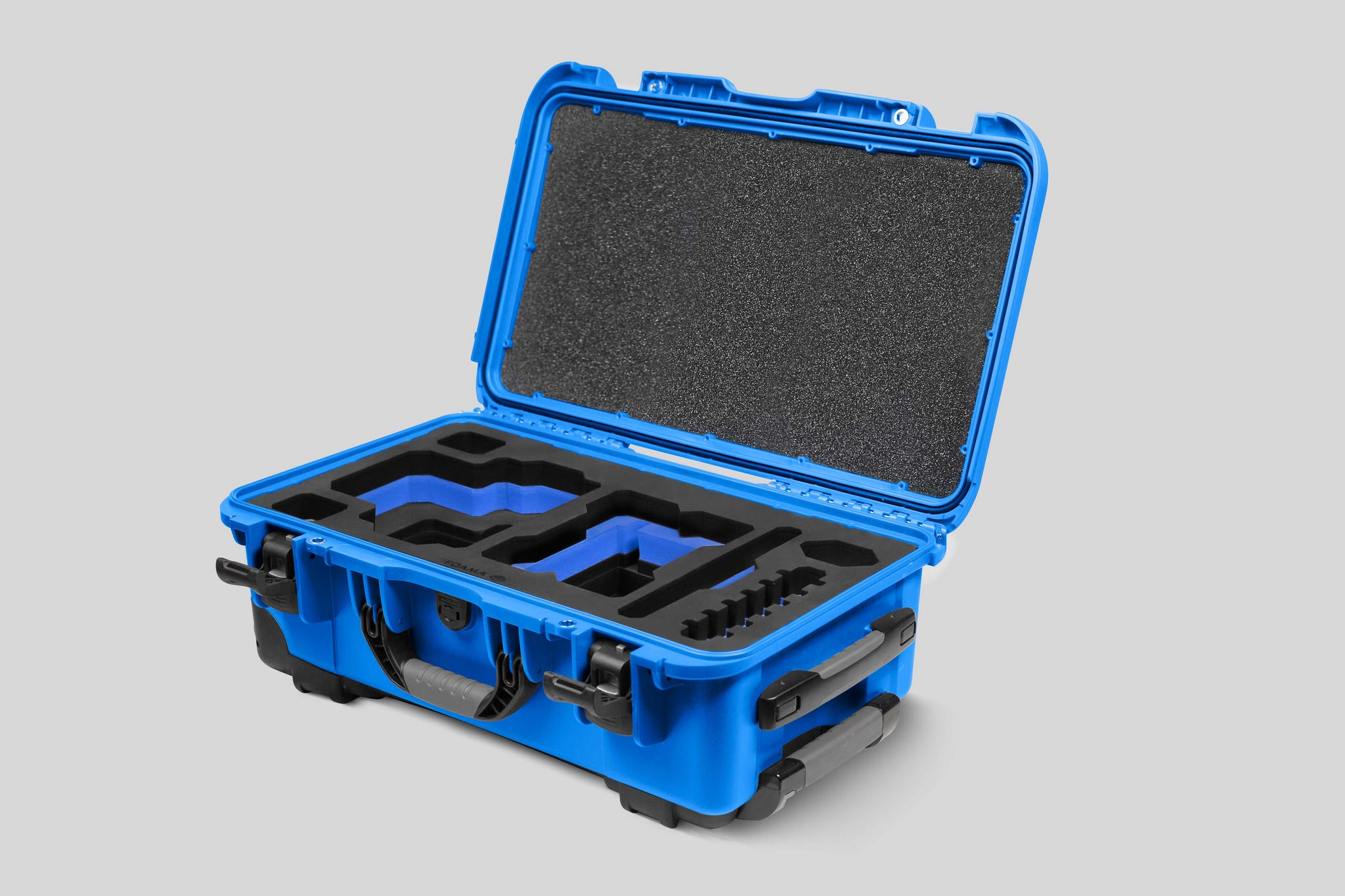 Angled View of a Red Raptor-X Blue Color Carry-on Case with Custom Black Foam Insert