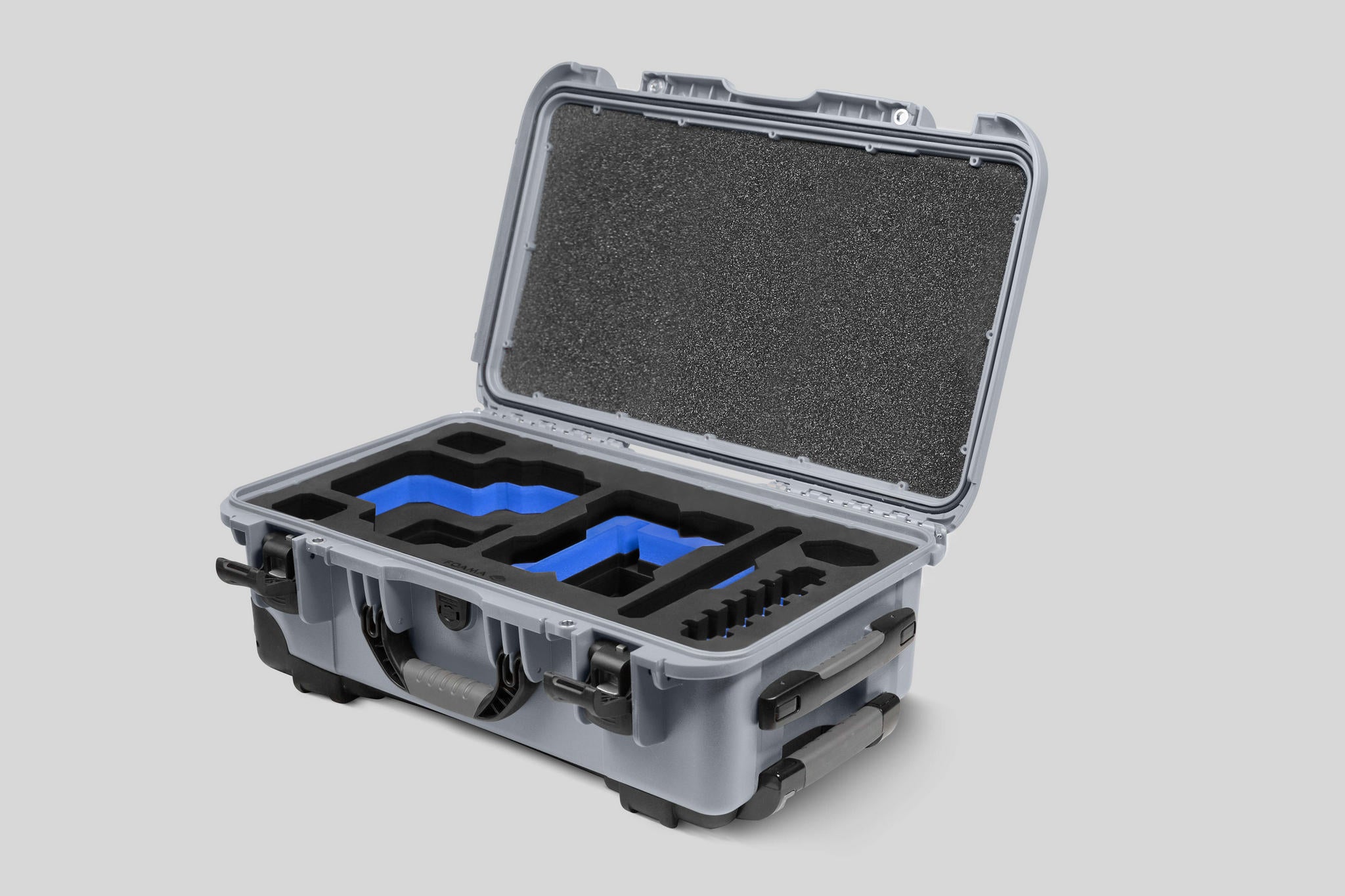 Angled View of a Red Raptor-X Silver Color Carry-on Case with Custom Blue Foam Insert