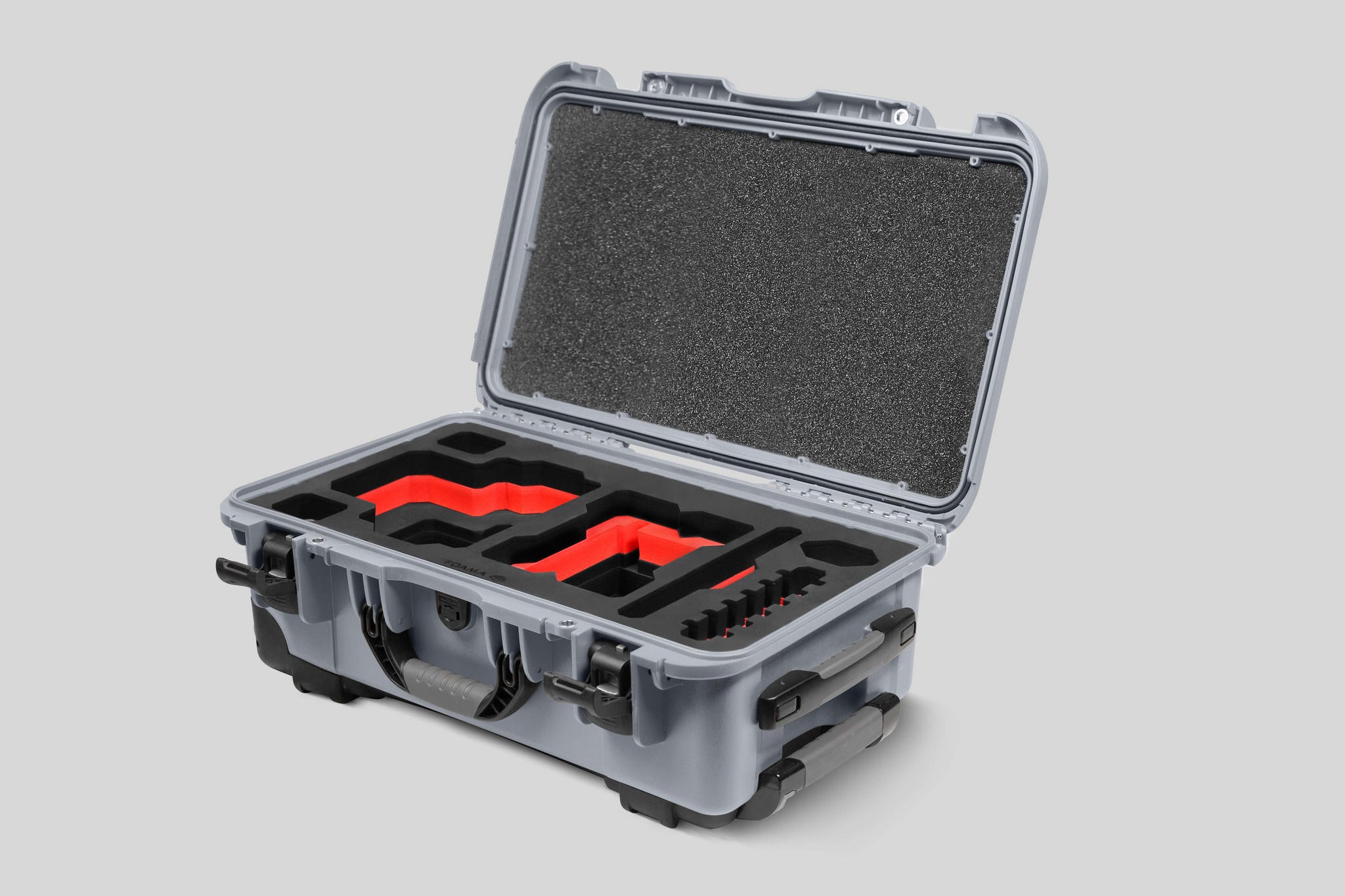 Angled View of a Red Raptor-X Silver Color Carry-on Case with Custom Red Foam Insert